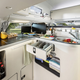 Illustration for article titled This Ingeniously Packaged Camper Packs Four People In A Tiny Van